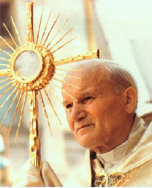 Picture of Pope with golden sun cross.