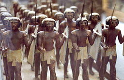 Photograph showing soldiers with dark skin, black hair, and African features